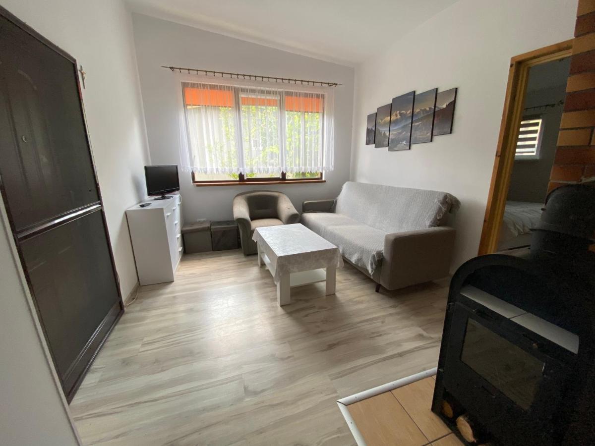 Domek Letniskowy Nad Jeziorem Wiejskim Lakie Extérieur photo